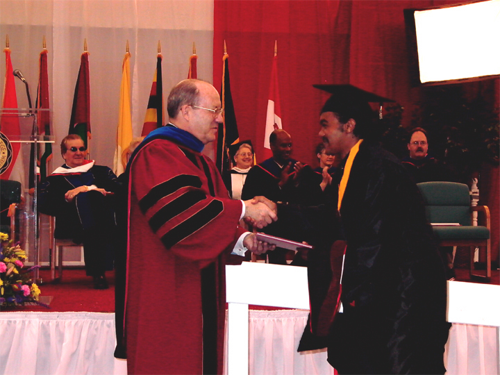 A Haile Selassie Scholar Receives His Diploma